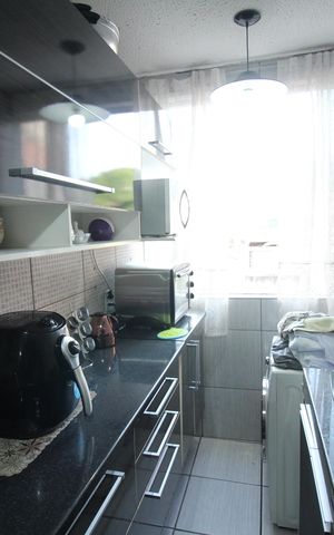 Apartamento à venda com 52m², 2 quartos e 1 vagaCozinha e Área de Serviço