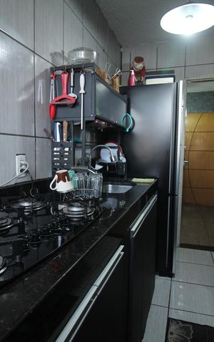Apartamento à venda com 52m², 2 quartos e 1 vagaCozinha e Área de Serviço