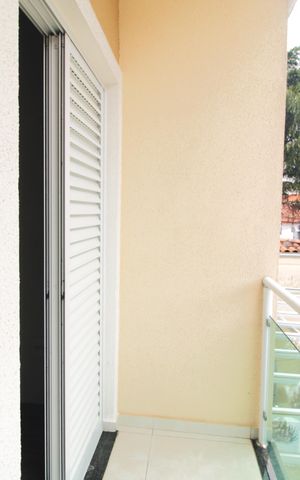 Casa para alugar com 110m², 2 quartos e 2 vagasSuíte 1 / sacada