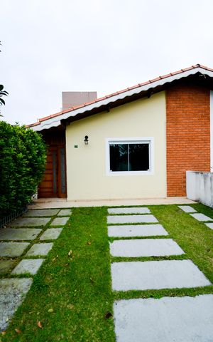 Casa de condomínio à venda com 100m², 2 quartos e 2 vagasFachada