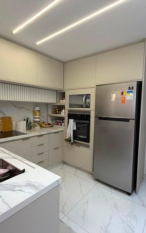 Casa à venda com 103m², 2 quartos e 2 vagas Casa à venda com 103m², 2 quartos e 2 vagasCozinha