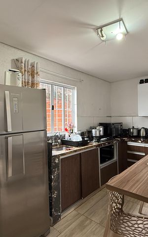 Casa à venda com 51m², 2 quartos e sem vaga Casa à venda com 51m², 2 quartos e sem vagaCozinha