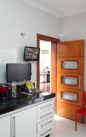 Casa à venda com 250m², 3 quartos e 3 vagasCozinha e Área de Serviço