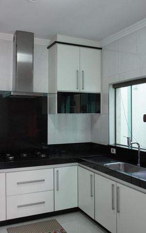 Casa à venda com 250m², 3 quartos e 3 vagasCozinha e Área de Serviço