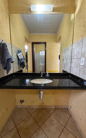 Casa à venda com 440m², 6 quartos e 6 vagasBanheiro 3