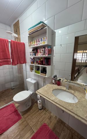 Casa à venda com 440m², 6 quartos e 6 vagasBanheiro da Suíte 2