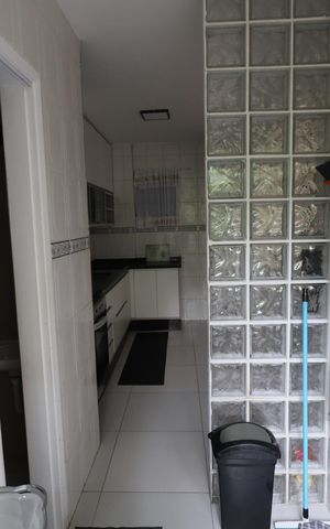 Apartamento à venda com 58m², 2 quartos e 2 vagasCozinha e Área de Serviço