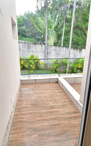 Casa de condomínio para alugar com 498m², 3 quartos e 4 vagasQuarto 3 - Suíte  Sacada