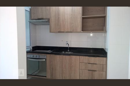 Apartamento para alugar com 50m², 1 quarto e 1 vagaDetalhes da cozinha com cooktop e forno elétrico