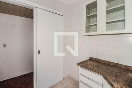 Cozinha e Área de Serviço de apartamento à venda com 3 quartos, 83m² em Auxiliadora, Porto Alegre
