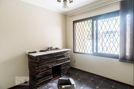 Sala de casa à venda com 3 quartos, 130m² em São Geraldo, Porto Alegre