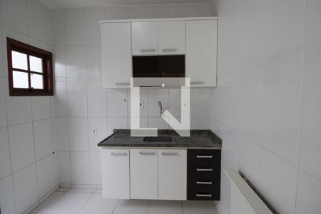 Casa de condomínio para alugar com 70m², 2 quartos e 1 vagaCozinha - Armários