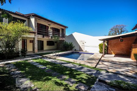 Casa de condomínio à venda com 480m², 5 quartos e 2 vagasFachada - Piscina - Churrasqueira