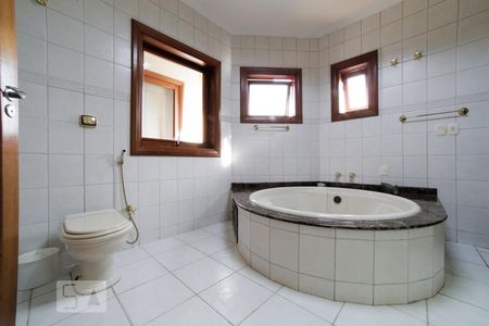 Casa de condomínio à venda com 441m², 4 quartos e 3 vagasBanheiro Suíte 1