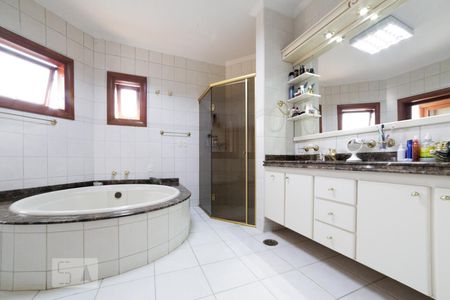 Casa de condomínio à venda com 441m², 4 quartos e 3 vagasBanheiro Suíte 1