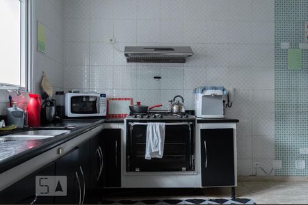 Casa à venda com 310m², 4 quartos e 2 vagas Casa à venda com 310m², 4 quartos e 2 vagasCozinha