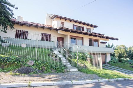 Casa de condomínio para alugar com 450m², 5 quartos e 2 vagas Casa de condomínio para alugar com 450m², 5 quartos e 2 vagasFachada