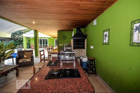 Casa de condomínio à venda com 850m², 4 quartos e 4 vagas Casa de condomínio à venda com 850m², 4 quartos e 4 vagasÁrea Externa - Churrasqueira - Espaço Gourmet