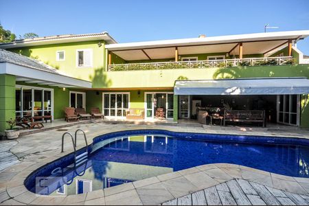 Casa de condomínio à venda com 850m², 4 quartos e 4 vagas Casa de condomínio à venda com 850m², 4 quartos e 4 vagasÁrea Externa - Piscina - Fachada