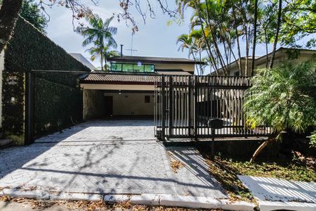 Casa de condomínio para alugar com 450m², 4 quartos e 5 vagasFachada