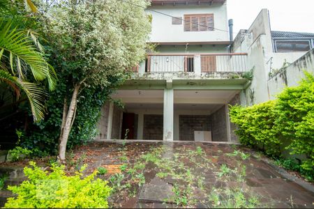 Casa à venda com 216m², 4 quartos e 3 vagas Casa à venda com 216m², 4 quartos e 3 vagasFachada