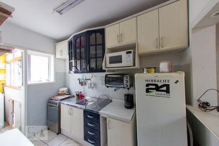 Cozinha de apartamento à venda com 2 quartos, 53m² em Medianeira, Porto Alegre