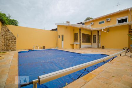 Casa de condomínio à venda com 458m², 4 quartos e 3 vagas Casa de condomínio à venda com 458m², 4 quartos e 3 vagasPiscina