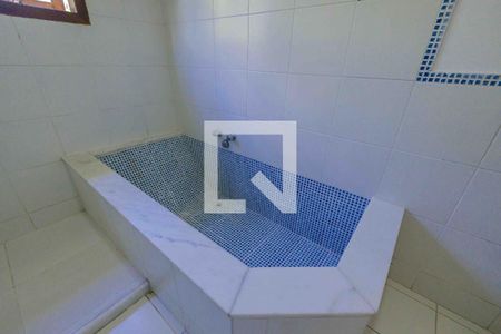 Casa de condomínio à venda com 275m², 4 quartos e 5 vagasBanheiro Suíte