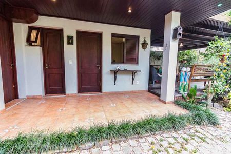 varanda de casa à venda com 5 quartos, 370m² em Jardim Botânico, Porto Alegre