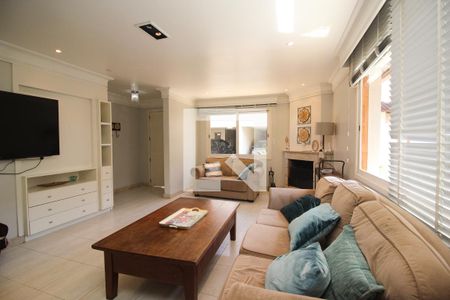 Sala de estar de casa de condomínio para alugar com 4 quartos, 320m² em Ipanema, Porto Alegre