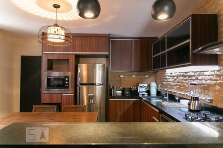 Casa à venda com 200m², 3 quartos e 2 vagas Casa à venda com 200m², 3 quartos e 2 vagasCozinha