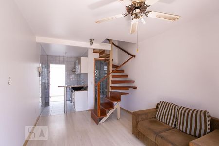 Sala de casa de condomínio à venda com 3 quartos, 90m² em Vila Nova, Porto Alegre