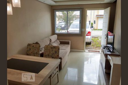 Sala de casa de condomínio à venda com 2 quartos, 80m² em Igara, Canoas