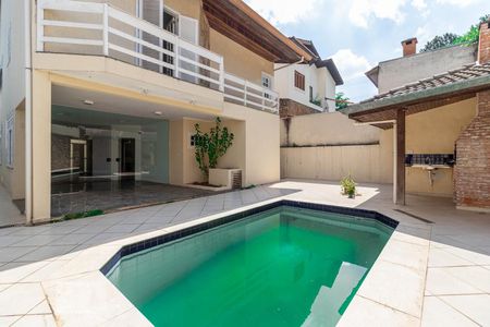 Casa de condomínio à venda com 316m², 4 quartos e 4 vagas Casa de condomínio à venda com 316m², 4 quartos e 4 vagasFachada Traseira