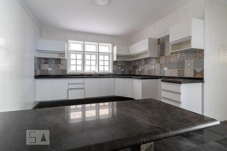 Casa de condomínio à venda com 316m², 4 quartos e 4 vagas Casa de condomínio à venda com 316m², 4 quartos e 4 vagasCozinha