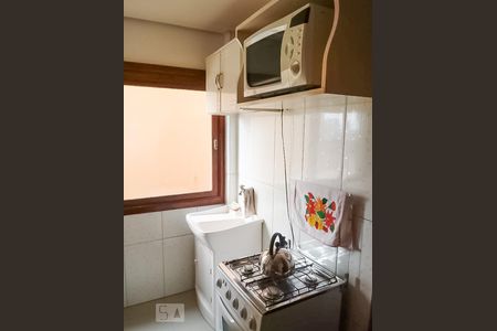 Cozinha de apartamento à venda com 1 quarto, 75m² em Santo Antônio, Porto Alegre