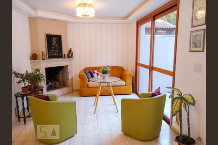 Sala de Estar de casa de condomínio à venda com 4 quartos, 334m² em Ipanema, Porto Alegre