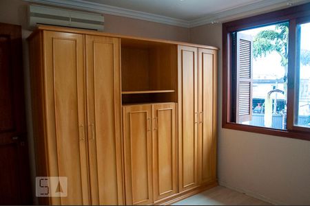 Casa de condomínio para alugar com 300m², 4 quartos e 3 vagasQuarto 1