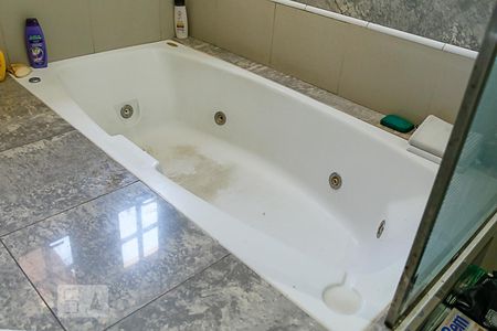 Casa à venda com 671m², 4 quartos e 8 vagasBanheiro Suíte 1