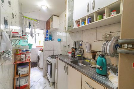 Apartamento à venda com 48m², 2 quartos e 1 vaga Apartamento à venda com 48m², 2 quartos e 1 vagaCozinha e Área de Serviço