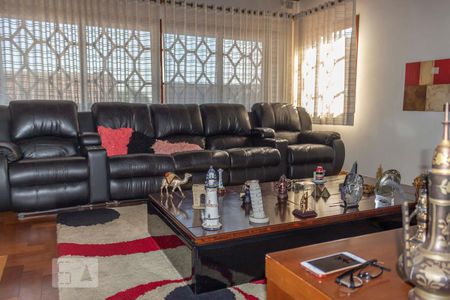 Casa de condomínio à venda com 444m², 4 quartos e 6 vagasSala 1