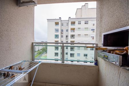 Varanda com churrasqueira  de apartamento à venda com 2 quartos, 48m² em Protásio Alves, Porto Alegre