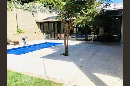 Casa de condomínio à venda com 402m², 4 quartos e 5 vagas