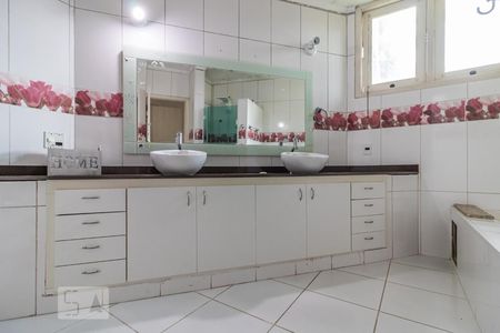 Casa de condomínio para alugar com 900m², 8 quartos e 4 vagas Casa de condomínio para alugar com 900m², 8 quartos e 4 vagasBanheiro da Suíte 1