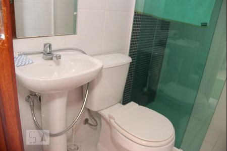 Casa de condomínio à venda com 260m², 4 quartos e 3 vagasBanheiro de Serviço