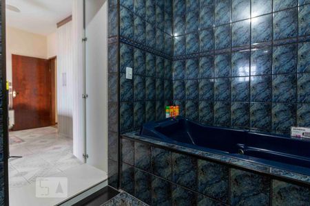 Casa à venda com 218m², 3 quartos e 2 vagasBanheiro Quarto 1 - Suite