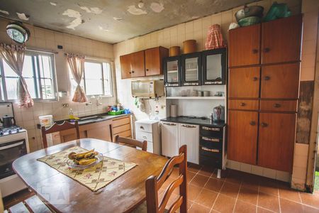 Casa à venda com 90m², 3 quartos e 2 vagas Casa à venda com 90m², 3 quartos e 2 vagasCozinha