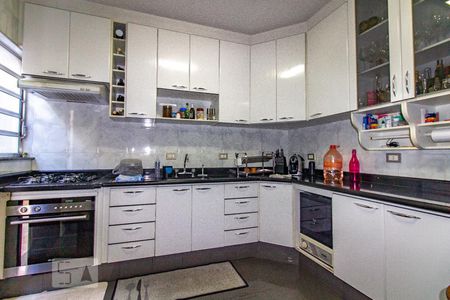 Casa à venda com 180m², 3 quartos e 4 vagas Casa à venda com 180m², 3 quartos e 4 vagasCozinha