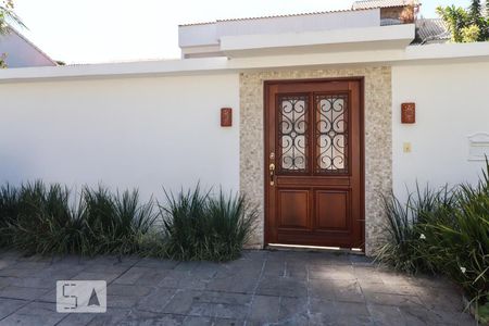 Casa de condomínio para alugar com 540m², 5 quartos e 5 vagasFachada