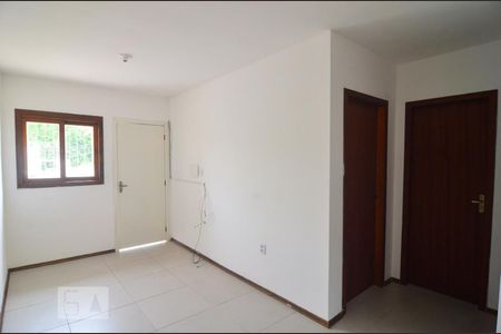 Sala e cozinha de casa à venda com 2 quartos, 44m² em Olaria, Canoas